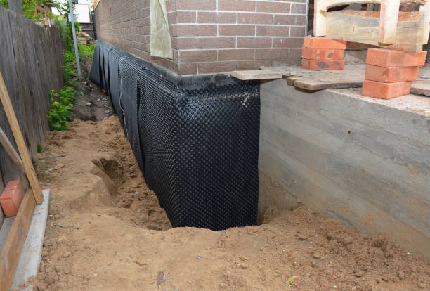 SJ Waterproofing Pros technician performing targeted Sump Pump Installation assessment in Soddy-Daisy, TN